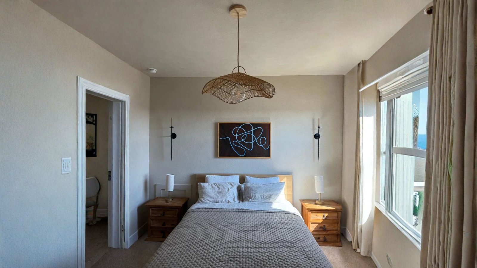 Lotus Rattan Pendant Light installed above kitchen island